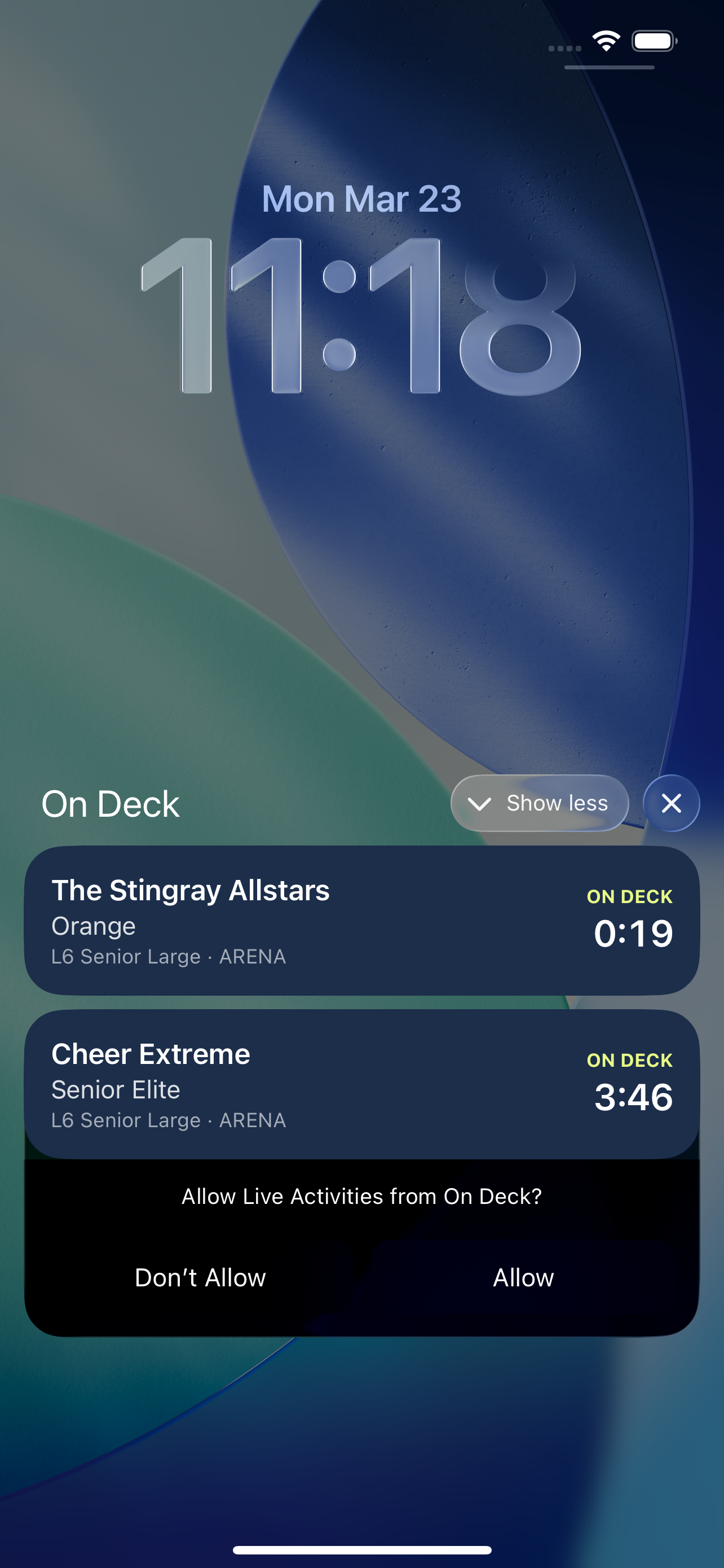 iPhone lock screen showing Live Activity countdown to next performance